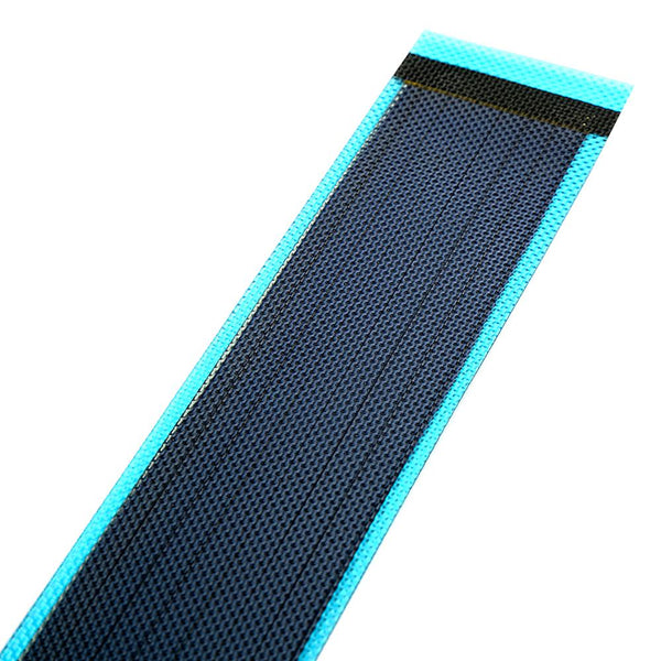 Image showcasing the flexible solar cell laying flat on a table.