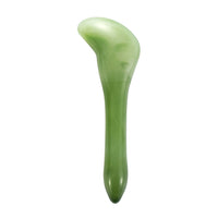 Mushroom jade stone facial roller in use