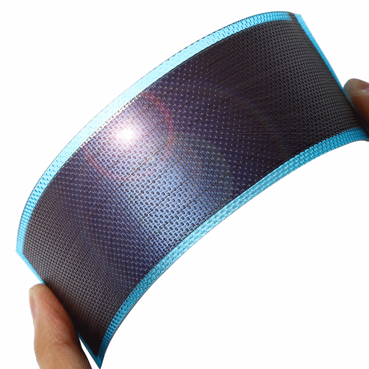 Image showcasing the flexible solar cell laying flat on a table.