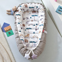 Portable baby crib bed in nursery setting