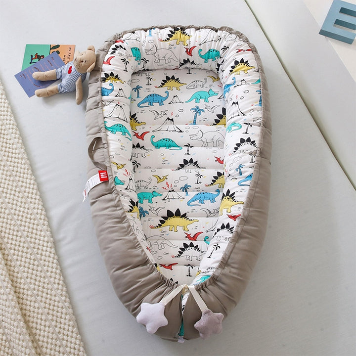 Portable baby crib bed in nursery setting