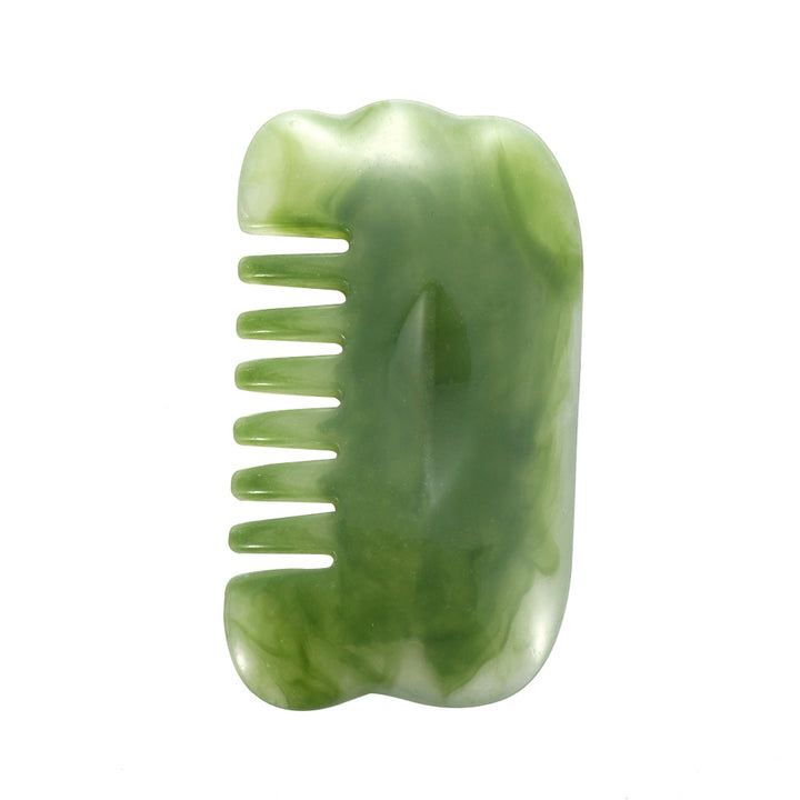 Mushroom jade stone facial roller in use