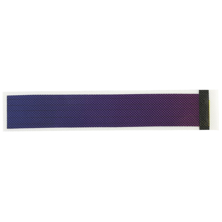 Image showcasing the flexible solar cell laying flat on a table.