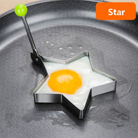 Stainless steel egg and pancake shaper with handle.