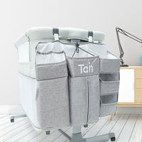 Foldable bedside organizer for baby crib