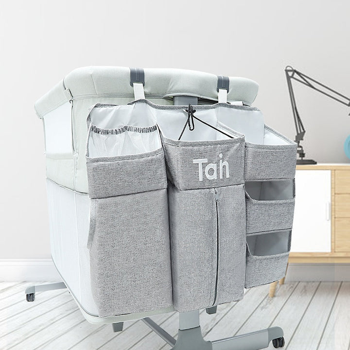 Foldable bedside organizer for baby crib