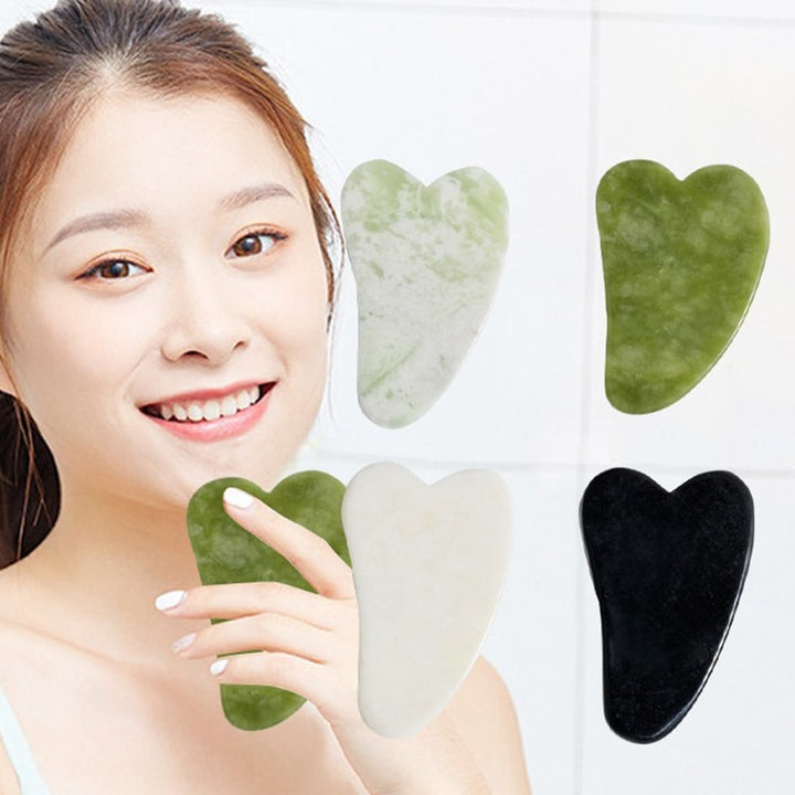 Health care Guasha scraper face lifting massage tool in use