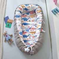 Portable baby crib bed in nursery setting