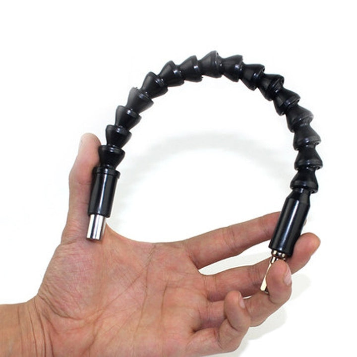 Close-up of the flexible shaft adapter, showcasing its material and flexibility.