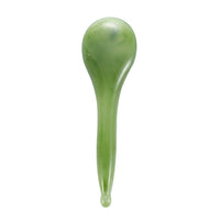 Mushroom jade stone facial roller in use