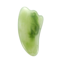 Mushroom jade stone facial roller in use