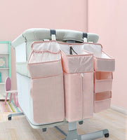 Foldable bedside organizer for baby crib