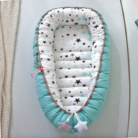 Portable baby crib bed in nursery setting