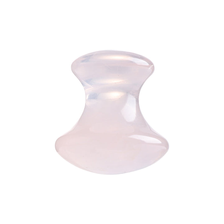 Mushroom jade stone facial roller in use