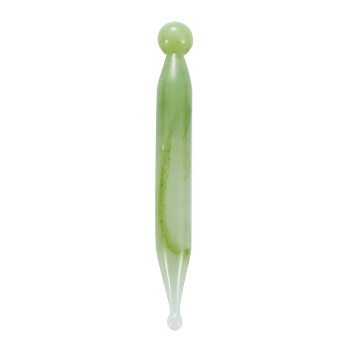 Mushroom jade stone facial roller in use