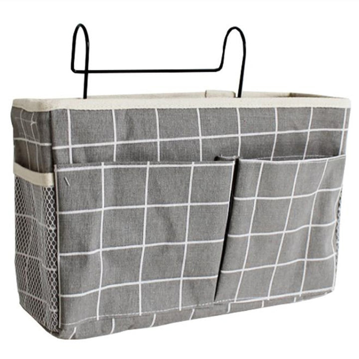 Foldable bedside organizer for baby crib