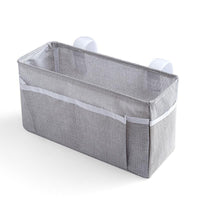 Baby bed organizer with diaper and toy storage capabilities