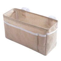 Baby bed organizer with diaper and toy storage capabilities