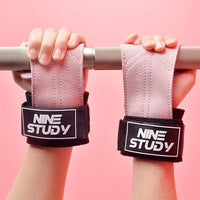 Pair of pink women's leather gym gloves