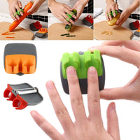 Stainless palm peeler with rubber finger grip.