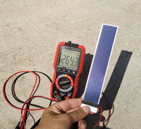Image showcasing the flexible solar cell laying flat on a table.