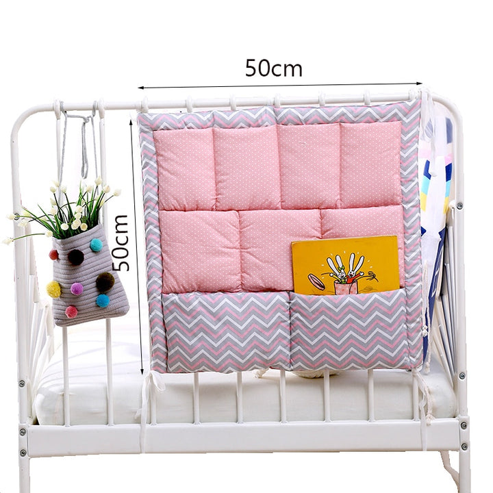 Foldable bedside organizer for baby crib