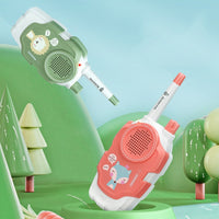 Kids using walkie talkies outdoors