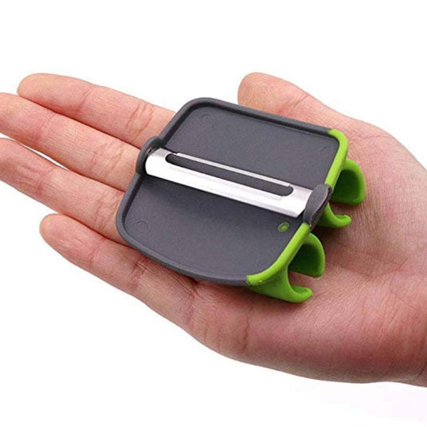 Stainless palm peeler with rubber finger grip.