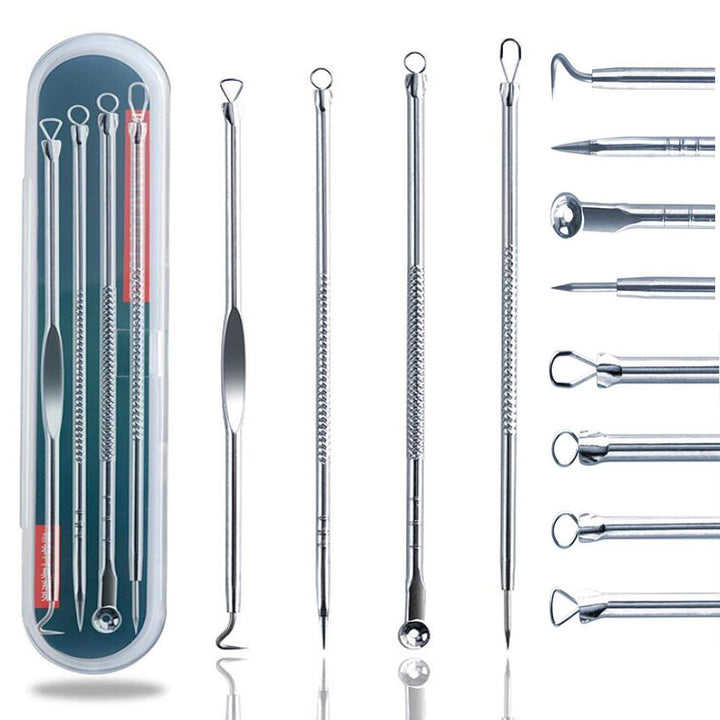 Set of stainless steel blackhead and pimple remover tools in a metal case