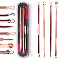 Set of stainless steel blackhead and pimple remover tools in a metal case