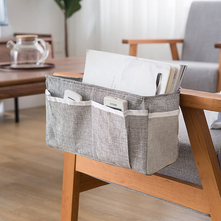 Baby bed organizer with diaper and toy storage capabilities
