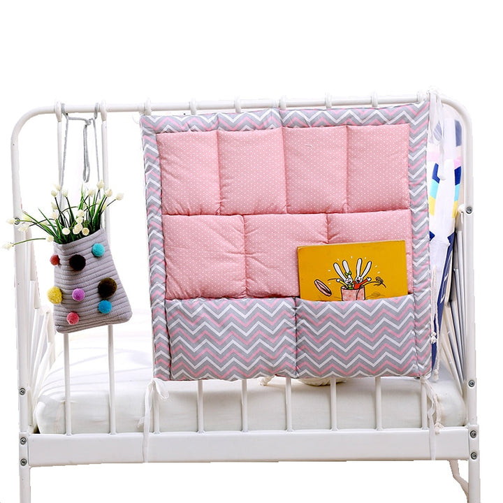 Foldable bedside organizer for baby crib