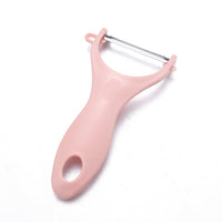 Manual rotating grater in rose red
