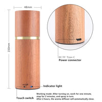 Aromatherapy diffuser with wooden base and glass design