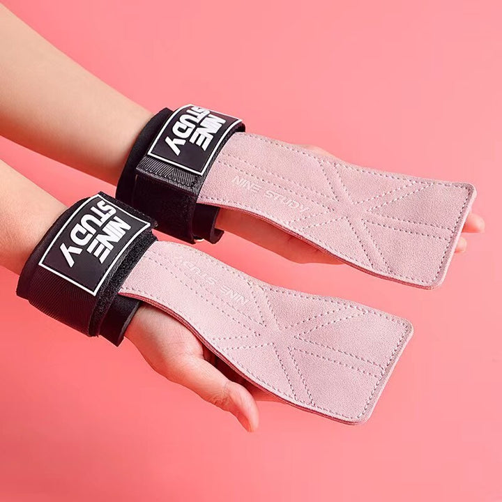 Pair of pink women's leather gym gloves