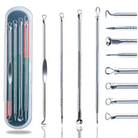Set of stainless steel blackhead and pimple remover tools in a metal case