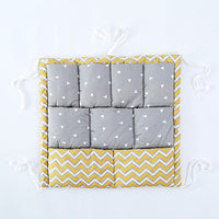 Foldable bedside organizer for baby crib