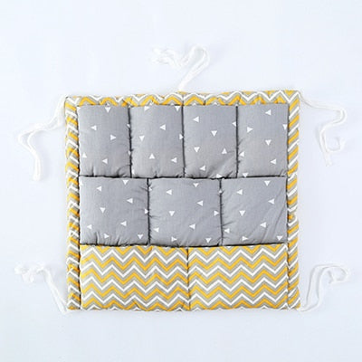 Foldable bedside organizer for baby crib