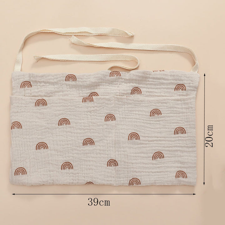 Foldable bedside organizer for baby crib