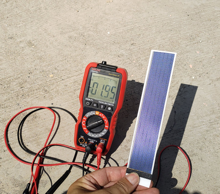 Image showcasing the flexible solar cell laying flat on a table.
