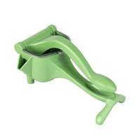 Manual lemon juicer in green