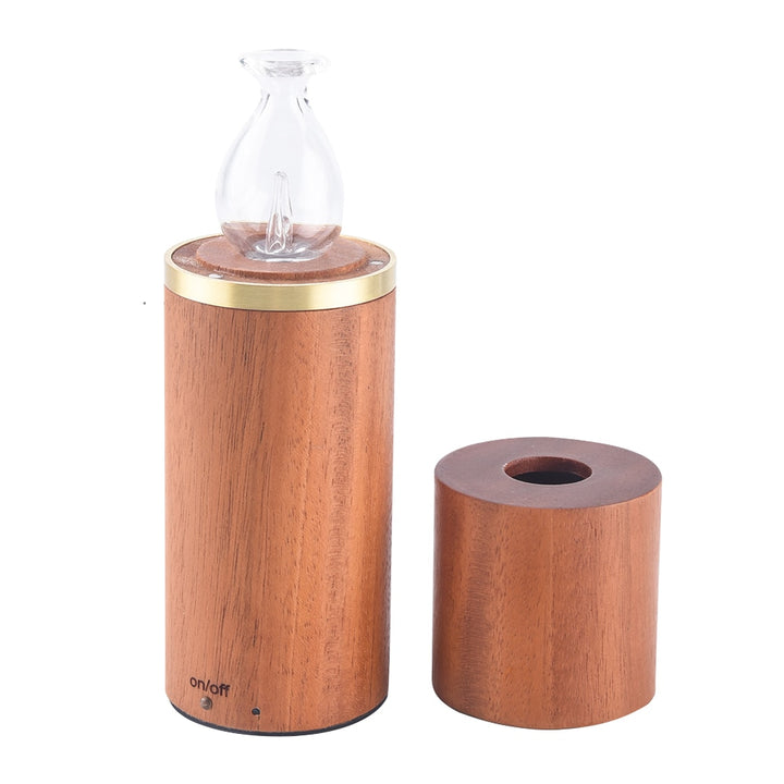 Aromatherapy diffuser with wooden base and glass design